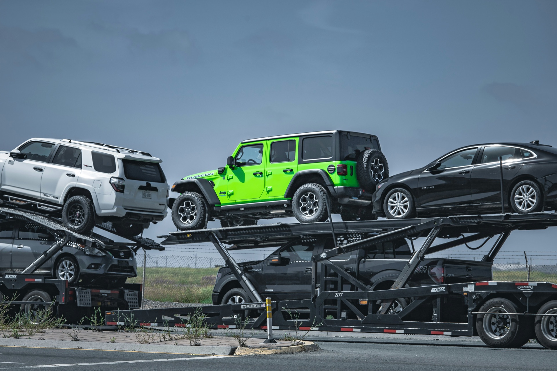 Vehicles loaded on an auto transport carrier