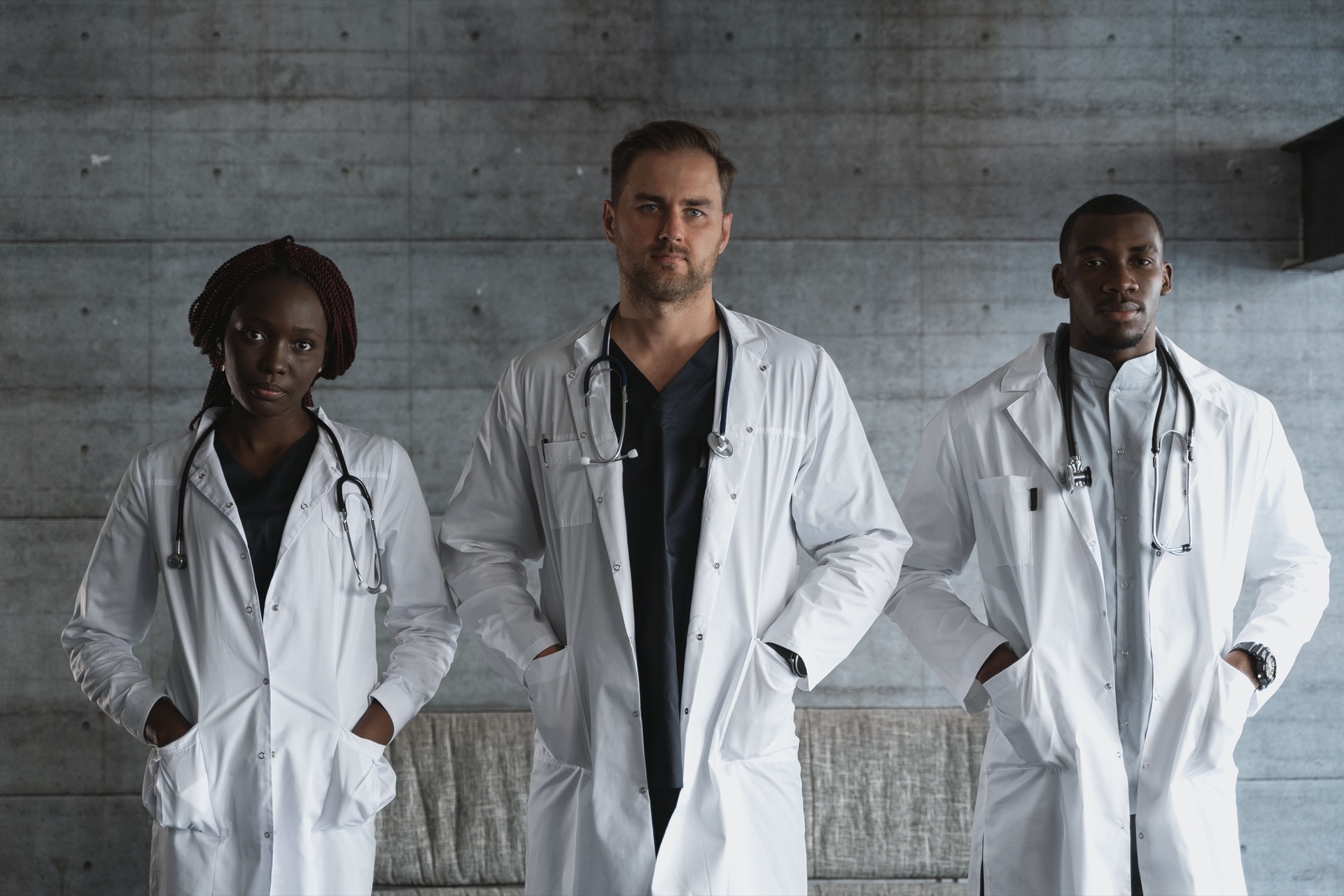 A team of doctors standing together in a clinic